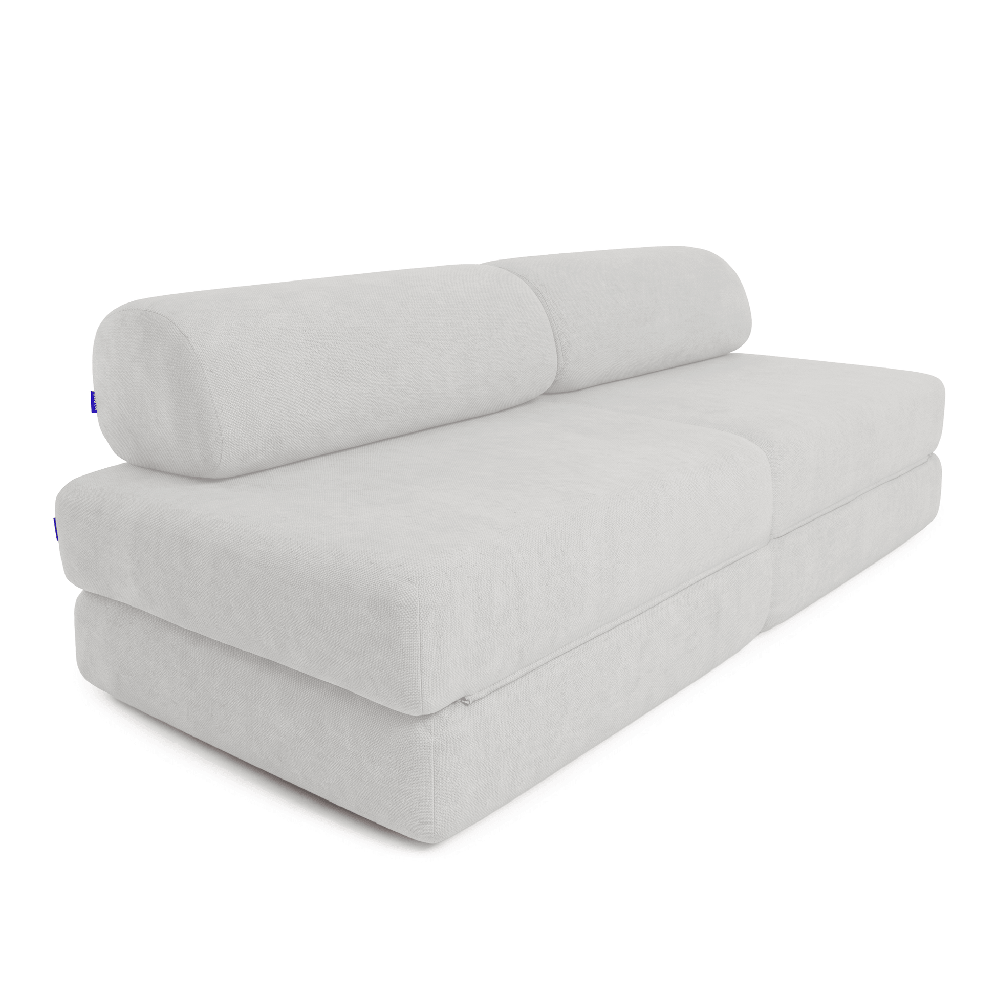 A ivory white modular upholstered Sonno Sofa Bed with a low-profile rectangular base, two thick back cushions, and a clean studio presentation on a white background.