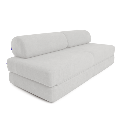 A light gray modular upholstered sofa with a low-profile rectangular base, two thick back cushions, and a clean studio presentation on a white background.