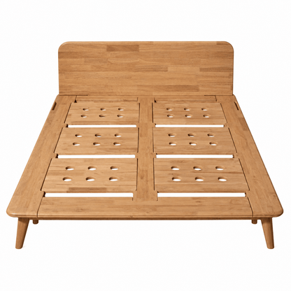 A light natural wood platform Sonno Signature bed frame with a slatted headboard and legs, shown from a top-down angle on a white background.
