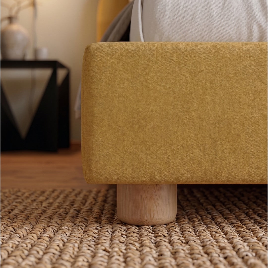 Yellow Sunset Bed Frame on a textured rug