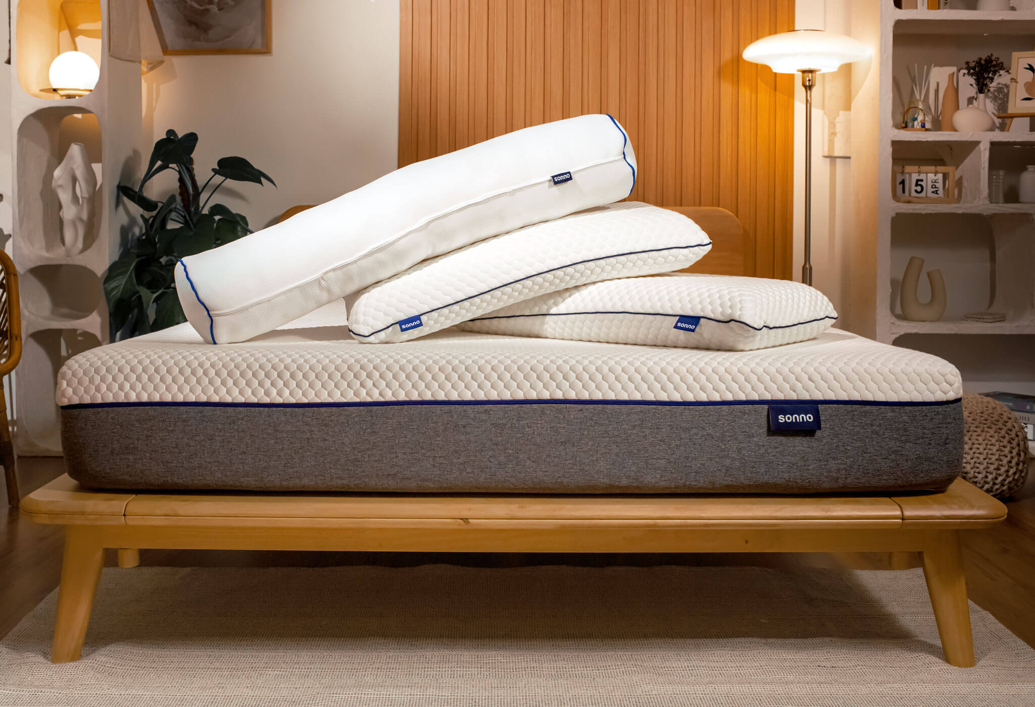 Sonno Bolster and Sonno Pillow layered on a Sonno Original Mattress in a Japandi bedroom